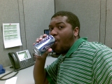 me, at work in denver, co in my cubicle drinking a bud light