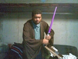me, at home in my room dressed as a jedi (for fun) 